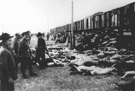 During the deportation of survivors of a pogrom in Iasi to Calarasi or Podul Iloaei, Romanians halt a train to throw off the bodies